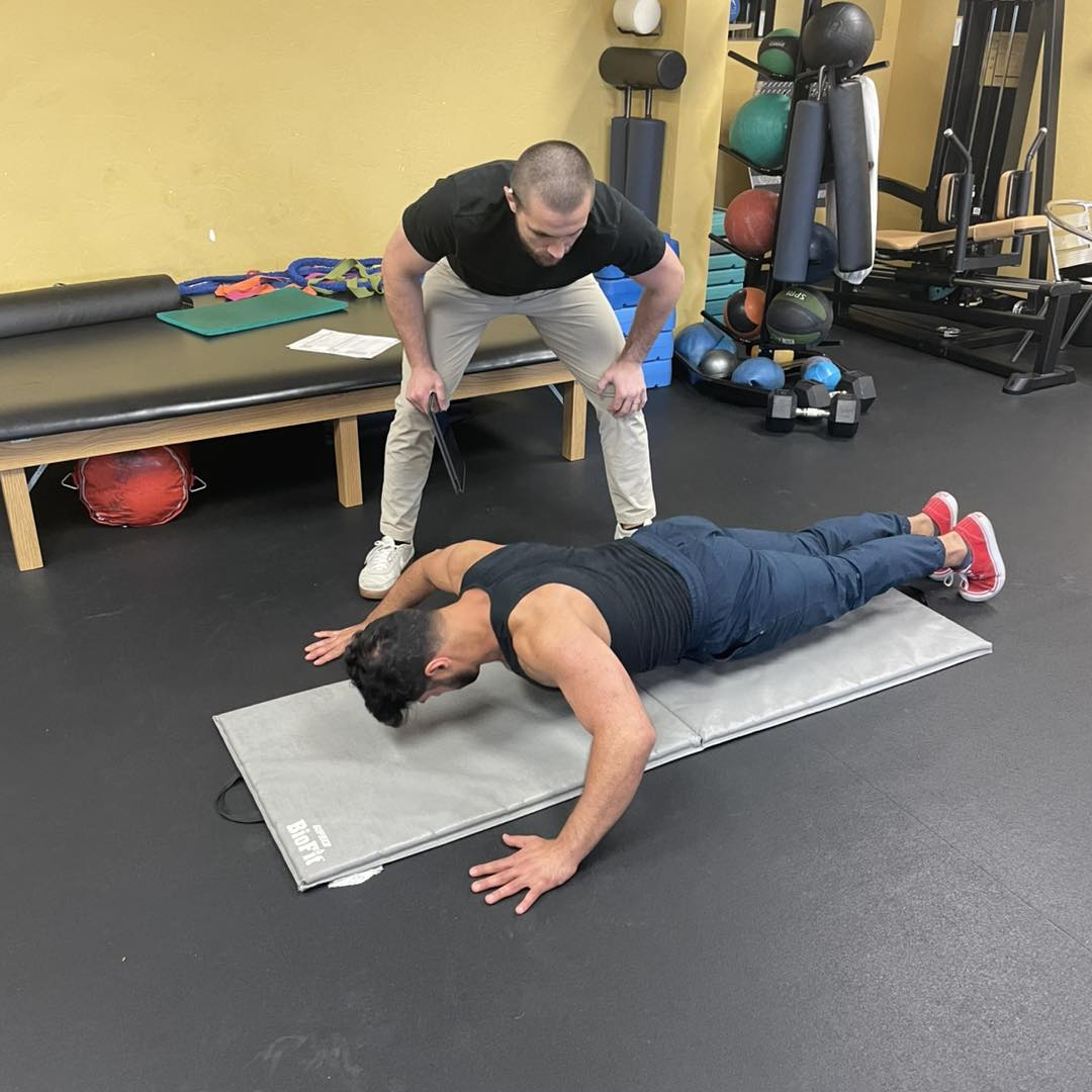 Push-up position assessment with clipboard evaluation