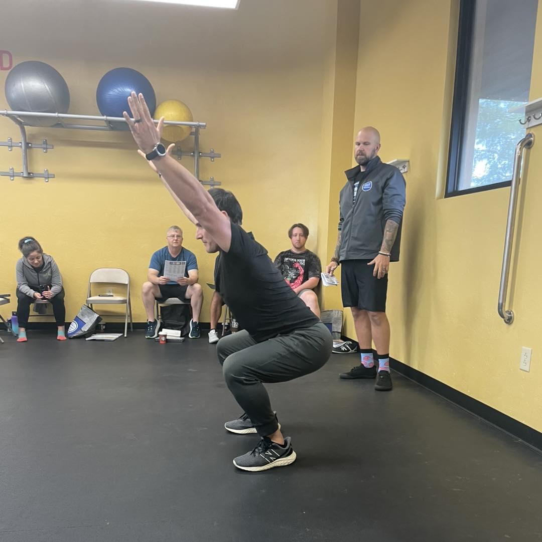Overhead squat assessment during live case study
